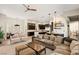 Open concept Gathering room and kitchen with ample seating and island at 9113 Golden Eagle Dr, Las Vegas, NV 89134