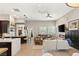Open floor plan boasting a modern kitchen and comfortable Gathering room at 9113 Golden Eagle Dr, Las Vegas, NV 89134