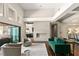 Open living area with a fireplace and view of the kitchen at 9113 Golden Eagle Dr, Las Vegas, NV 89134