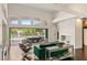 Open living area with a fireplace and access to the backyard at 9113 Golden Eagle Dr, Las Vegas, NV 89134