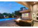 Enjoy the pool and patio at night at 9113 Golden Eagle Dr, Las Vegas, NV 89134
