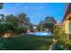 Tranquil pool and spa surrounded by lush landscaping at 9113 Golden Eagle Dr, Las Vegas, NV 89134