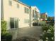 The backyard features a spacious patio and mature landscaping perfect for outdoor activities and enjoyment at 927 Via Canale Dr, Henderson, NV 89011
