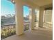 A balcony offers beautiful views of the lush golf course and the surrounding landscape for outdoor enjoyment at 927 Via Canale Dr, Henderson, NV 89011