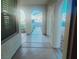 Covered entryway with arched details and views to the street at 927 Via Canale Dr, Henderson, NV 89011