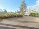 Landscaped front yard with paved courtyard and fountain at 927 Via Canale Dr, Henderson, NV 89011