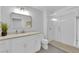 Modern bathroom features a glass-enclosed shower, vanity with mirror, and neutral color scheme at 9609 Eagle Valley Dr, Las Vegas, NV 89134