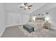 This spacious bedroom includes cool colors and a ceiling fan at 9609 Eagle Valley Dr, Las Vegas, NV 89134