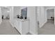 Hallway showcasing stylish decor, neutral color palette, and seamless flow to other living spaces at 9609 Eagle Valley Dr, Las Vegas, NV 89134