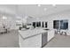Spacious kitchen island with seating and open access to the rest of the home at 9609 Eagle Valley Dr, Las Vegas, NV 89134
