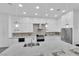 Bright kitchen with stainless steel appliances, a large island, and modern finishes at 9609 Eagle Valley Dr, Las Vegas, NV 89134