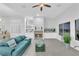 Cozy living room with a fireplace, comfortable seating, and plenty of natural light at 9609 Eagle Valley Dr, Las Vegas, NV 89134