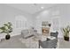 Cozy living room that features a fireplace, comfortable seating, and bright decor at 9609 Eagle Valley Dr, Las Vegas, NV 89134
