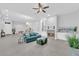 Spacious living area with tile flooring, a fireplace, and contemporary decor at 9609 Eagle Valley Dr, Las Vegas, NV 89134