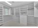 Walk-in closet featuring custom shelving and drawer units at 9609 Eagle Valley Dr, Las Vegas, NV 89134