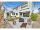 Landscaped backyard with fire pit and seating area at 10273 Sierra Skye Ave, Las Vegas, NV 89166