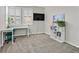 Bright home office featuring a desk, shelving, and natural light at 10273 Sierra Skye Ave, Las Vegas, NV 89166