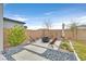 Relaxing patio area with fire pit and seating at 10273 Sierra Skye Ave, Las Vegas, NV 89166