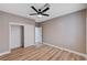 Bedroom with double door closet and ceiling fan at 10525 Findlay Ave, Las Vegas, NV 89134