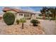 Backyard with gravel landscaping and solar panels on the roof at 10525 Findlay Ave, Las Vegas, NV 89134