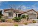 Single-story home with landscaped yard and tile roof at 10525 Findlay Ave, Las Vegas, NV 89134