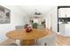 Open concept dining area with wood table and modern decor at 1108 Cunningham Dr, Las Vegas, NV 89106