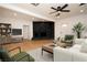 Living room featuring a stone fireplace and hardwood floors at 1108 Cunningham Dr, Las Vegas, NV 89106