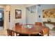 Inviting dining room with a round table and access to the staircase at 1136 Buckhorn Cove St, Henderson, NV 89011