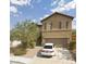 Traditional two-story home with shutters and well-maintained landscaping at 1136 Buckhorn Cove St, Henderson, NV 89011