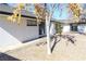 Charming backyard featuring mature trees, and a sliding glass door; perfect for outdoor living at 1403 5Th Pl, Las Vegas, NV 89104