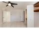 Bright bedroom showing the closet, ceiling fan, and doors at 1403 5Th Pl, Las Vegas, NV 89104