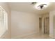 Bright bedroom with tiled floor, ceiling fan, and a view of the window at 1403 5Th Pl, Las Vegas, NV 89104