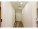 Bright closet features wood floors, white walls, and recessed lighting for ample storage space at 1403 5Th Pl, Las Vegas, NV 89104