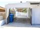 Wide driveway with a covered area and secure fencing for parking or storage at 1403 5Th Pl, Las Vegas, NV 89104