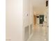 Hallway view showcasing the neutral paint and light, marble flooring leading into the house at 1403 5Th Pl, Las Vegas, NV 89104