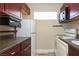 Compact kitchen featuring modern appliances and ample cabinet space at 1403 5Th Pl, Las Vegas, NV 89104