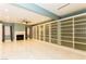 Spacious living room with built-in shelving, fireplace, and tile flooring at 1403 5Th Pl, Las Vegas, NV 89104