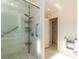 Accessible bathroom shower with glass door and grab bars for safety at 1403 5Th Pl, Las Vegas, NV 89104