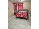 Cozy bedroom with a double bed and red bedding at 2109 Juana Vista St, Las Vegas, NV 89102