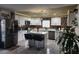 Modern kitchen featuring white cabinets, a large island, and stainless steel appliances at 2109 Juana Vista St, Las Vegas, NV 89102