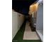 Side yard with a pathway and artificial turf at 2109 Juana Vista St, Las Vegas, NV 89102