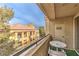 Private balcony with table and chairs, overlooking city views at 230 E Flamingo Rd # 412, Las Vegas, NV 89169