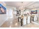 Elegant dining room with a chandelier and large mirror at 230 E Flamingo Rd # 412, Las Vegas, NV 89169