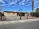 Ranch style home with carport and fenced yard at 2528 Flower Ave, North Las Vegas, NV 89030