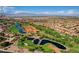 Beautiful aerial view of a golf course community with lush greenery and mountain views at 2540 Youngdale Dr, Las Vegas, NV 89134