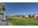 A sunny view of the golf course from the tee box of 'Par 5' with fairways and mature trees defining the landscape at 2540 Youngdale Dr, Las Vegas, NV 89134