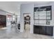 Modern kitchen with an island and stainless steel appliances that overlooks the dining area at 2540 Youngdale Dr, Las Vegas, NV 89134