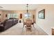 Bright dining area with a chandelier and access to the backyard at 2608 Dearport Ct, Henderson, NV 89052