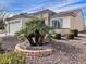 Charming single-story home with desert landscaping, stone accents, and a two-car garage at 2608 Dearport Ct, Henderson, NV 89052