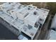 An aerial view shows townhouses with white roofs, air conditioning units, and garages at 2679 Jacyra Ave, Las Vegas, NV 89121